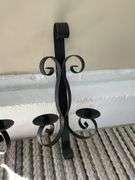 Pair of wrought metal double candle wall sconces