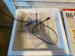 Quail egg incubator and turner