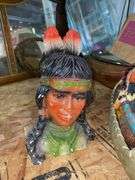 Native Americans in canoe figurine, two chalkware Native American heads - not all perfect