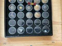 Military buttons and insignia