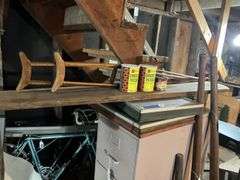 Concrete Patcher, wooden crutches, board, framed prints
