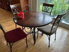 Wrought metal base table w/ round wooden top and set of four matching chairs w/ padded seats 44x44x30
