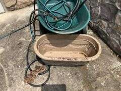 Wheelbarrow, garden hose, planter box, snow shovel