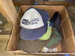 Box of baseball caps