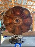 Antique electric heater w/ copper reflector, on cast iron base
