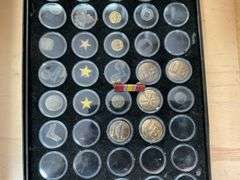 Military buttons and insignia