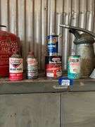 Vintage automotive advertising tins