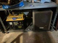 Contents of shelf: Wildfire WF1200 generator, vintage slide projector