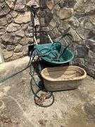 Wheelbarrow, garden hose, planter box, snow shovel