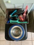 Dog dish, pet brushes, rolling tote