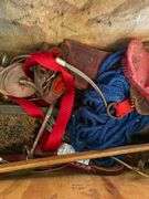 Horse tack in wooden crate