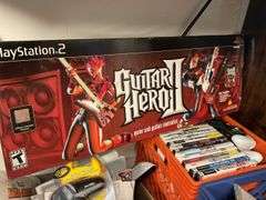 Sony PlayStation 2 consoles, Guitar Hero II, Wii, controllers, games, and accessories