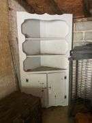 White corner cupboard w/ open top shelving, cupboard base
