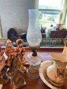 Collectibles lot: green art glass vase, glass Peanut pattern oil lamp, Christmas and other figurines, light strings, figural egg timer, misc