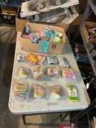 Large lot of vintage Happy Meal toys in packages including: Power Rangers, Flintstones, Barbie, Nintendo