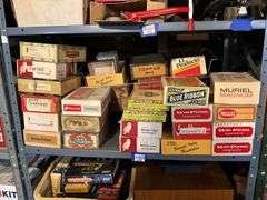 Contents of shelf: vintage cigar boxes