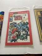 Zen action figure and two comic books