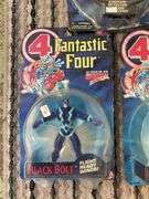 Three Fantastic Four action figures in packages