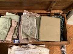 Contents of chest: lace and linens