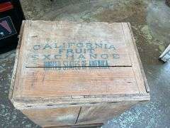 Two wooden advertising crates: Life Pears and Cutty Sark Whisky