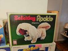 Wind-up and battery op toys in boxes including: Mother Goose, dog, pig, bears, calf