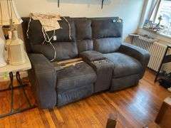 Gray double power recliner w/ central cup holders & USB jacks, 6 ft wide - no contents