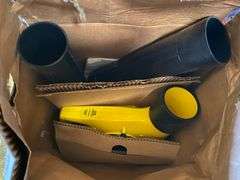 Yard blower in box, plastic kerosene can, antifreeze, motor oil, work gloves, misc