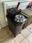 Dog dish, pet brushes, rolling tote