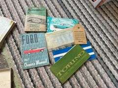 Vintage car manual collection and auto literature