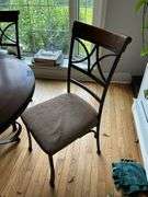 Wrought metal base table w/ round wooden top and set of four matching chairs w/ padded seats 44x44x30