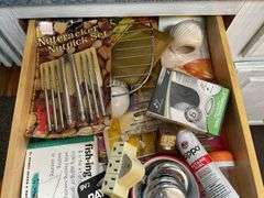 Contents of drawer: household items