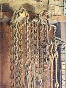 Tow chains, hay bale hook, misc