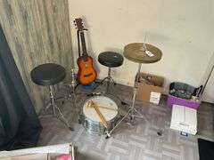 Snare drum, hi-hat cymbal, First Act guitar, two stools