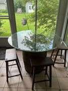 Barrel base round glass top table and four stools 48x48x36