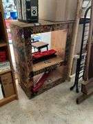 Wooden shelf unit covered w/ drawings - no contents 27.5x37x16.5
