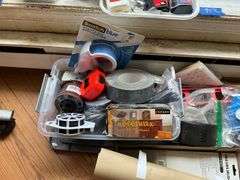Floor lot and contents of windowsill: level, hand tools, painting supplies, laser level, misc