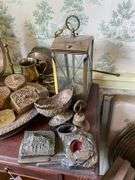 End stand, brass vanity mirror, metalware, vintage Zenith portable radio, GE plastic table radio, Cds, vintage adding machines, electric fans25.5x17.5x31