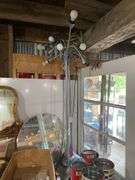 Two multi-lite adjustable arm floor lamps