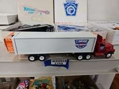 Three Winross model trucks in boxes: Maguire's Ford and PA Fish & Boat Commission