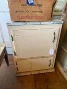Base cabinet w/ formica top, NRA pistol targets, shot shells 20.5x17x28