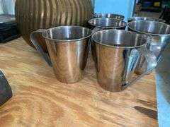 Copper jug, handled brass vase, metal cups set