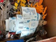 Toy lot including: Spider-Man car, WWE Sin Cara action figure, Transformers, misc