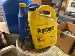 Yard blower in box, plastic kerosene can, antifreeze, motor oil, work gloves, misc