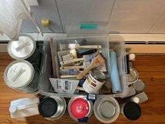 New paint brushes, scraper, paints, painting supplies