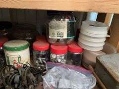 Contents of two shelves: hardware, misc