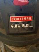 Two Craftsman shop vacs, fire extinguishers, package tape handle