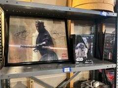 Contents of shelf: RC Star Wars R2D2 toy in box, Ray Park as Darth Maul framed print