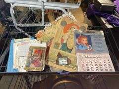 Paper ephemera including: postcards, child's Christmas book, 1960 advertising calendar