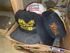 Box of baseball caps