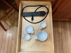 Contents of four drawers: gadgets, household items, measuring cups, power strip, misc